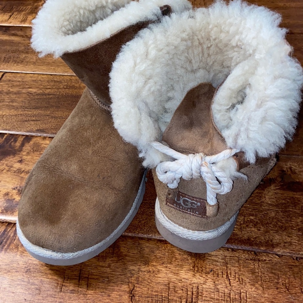 Chestnut brown UGG with rope tie in back.